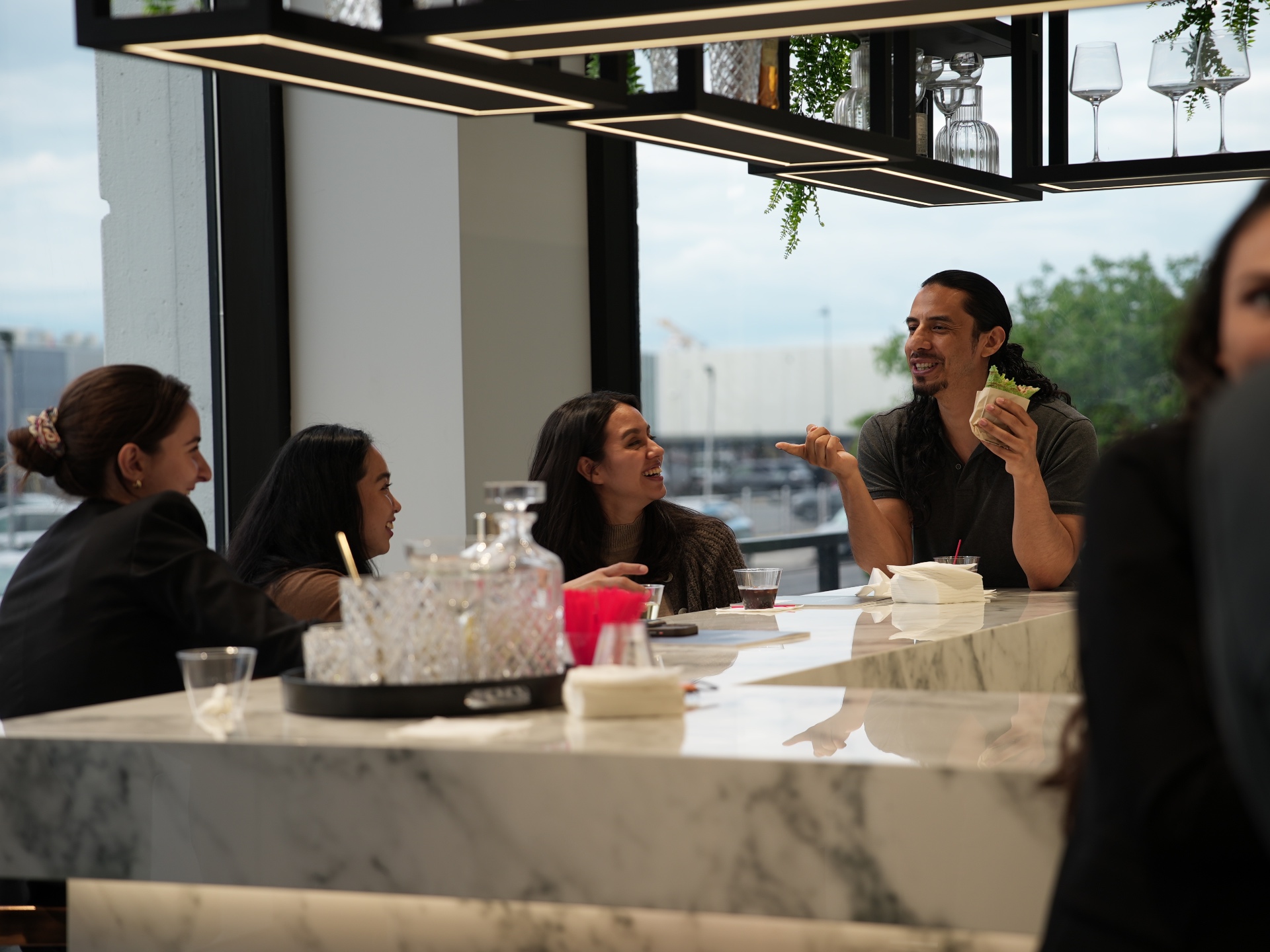 Blueprint Society members talking and smiling at a Porcelanosa evening