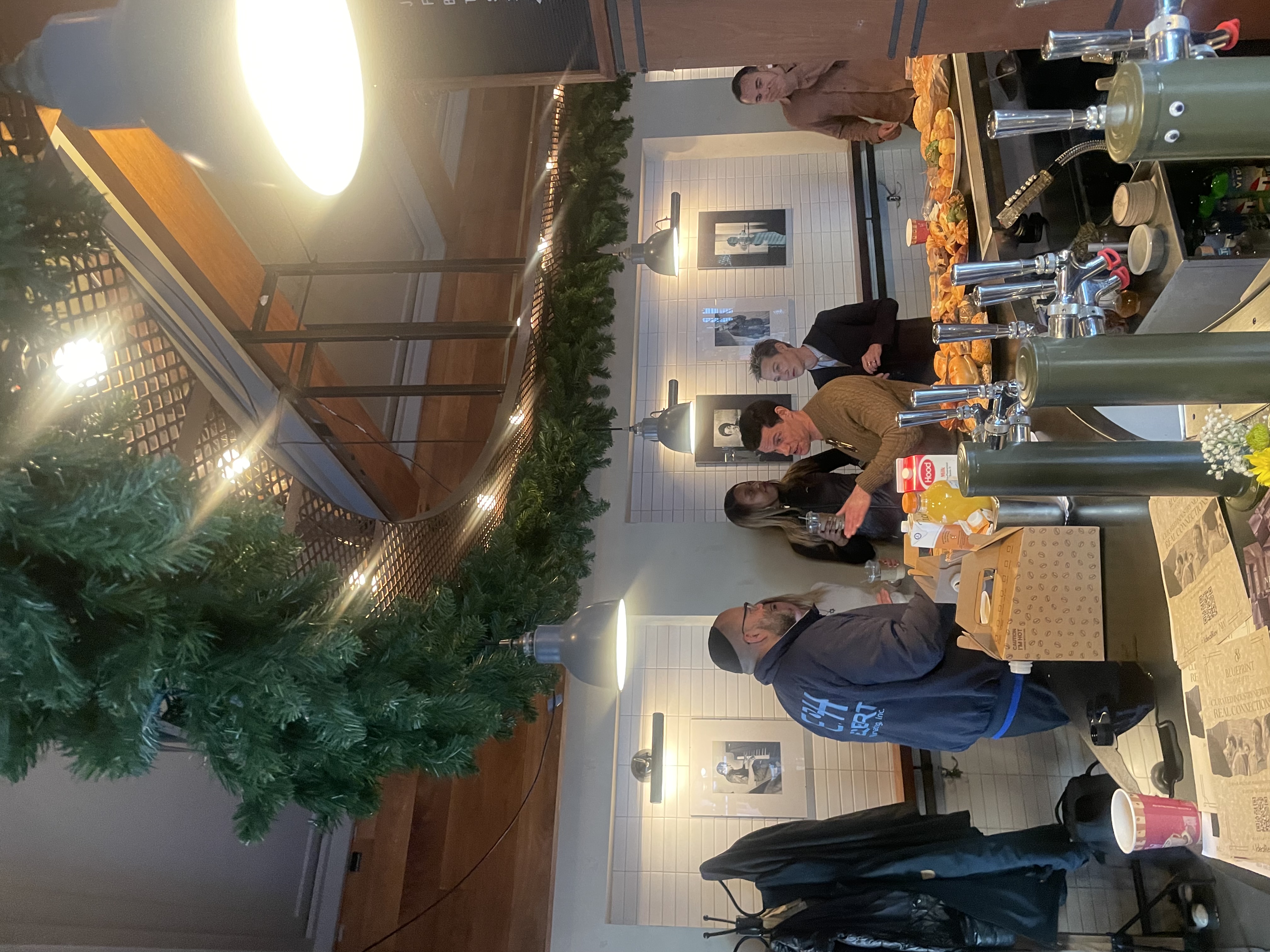 Contractors sharing projects at a Blueprint Society networking breakfast in Brooklyn