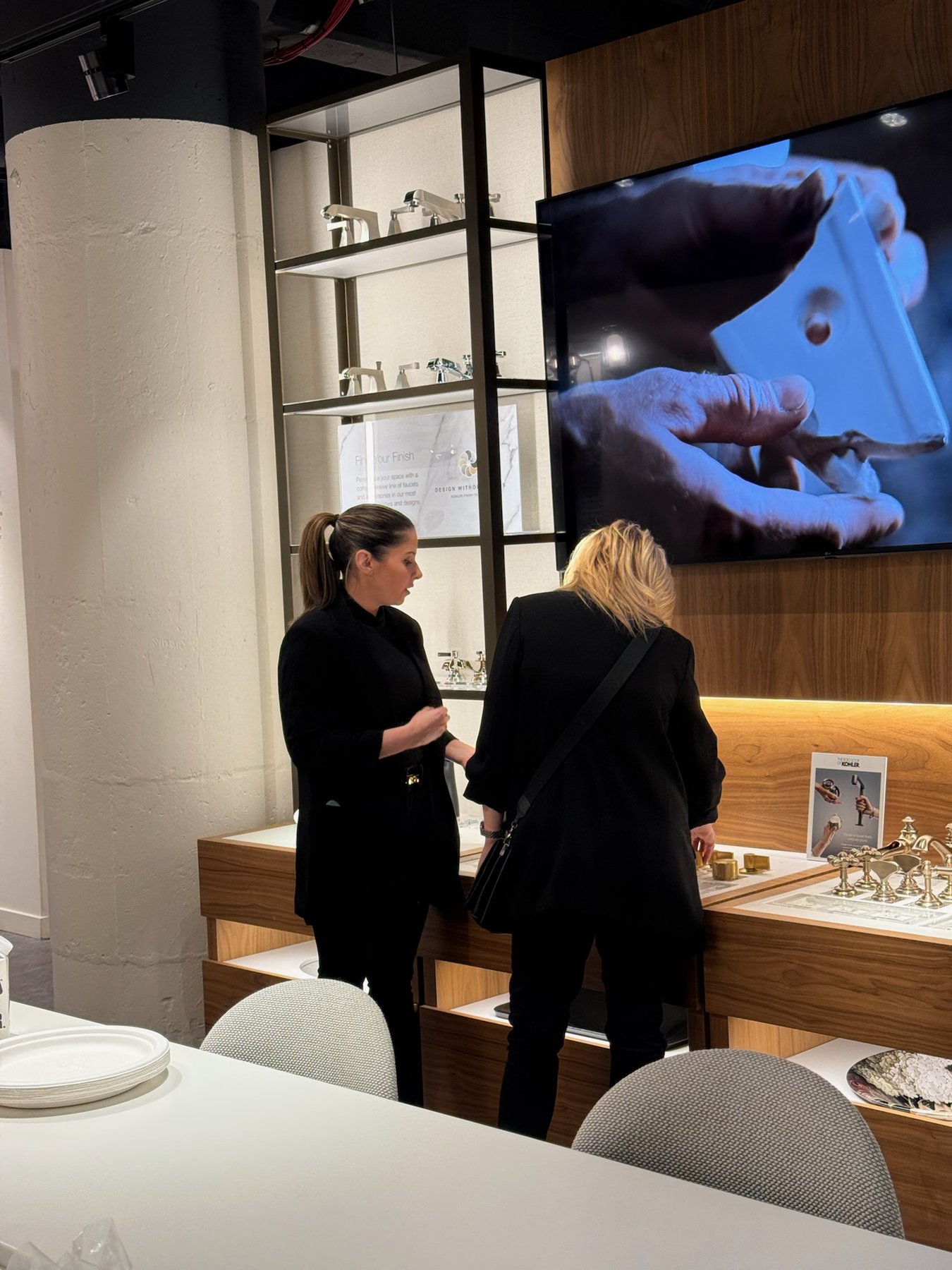 Interior designers networking at the KOHLER showroom with Blueprint Society